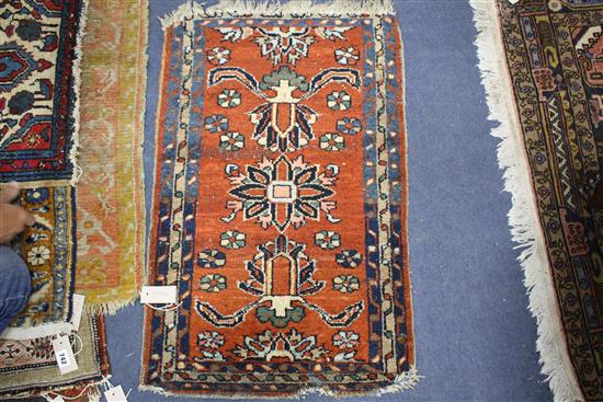 A pair of Persian blue ground small mats, decorated with animals amongst trees and flowers, and three other mats with stylised floral